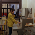 Perfectly good payphones in the house and she needs to use the emergency band
