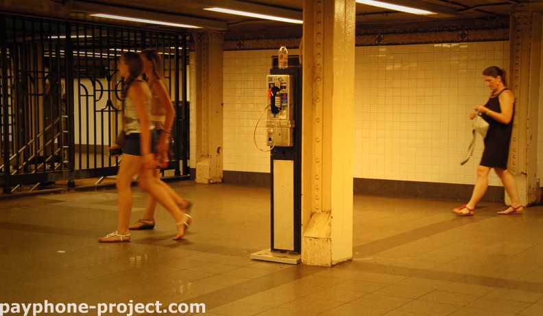 (212) 245-9715. 57th Street N/Q/R Station. July, 2012. PTS