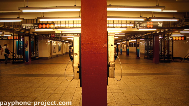 Janusian payphones. (212) 997-8834, (212) 997-5097. 42nd St/6th Ave B/D/F/M Subway.