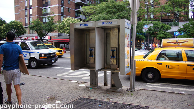 42nd St/9th Ave. Van Wagner Kiosk Advertising Payphones.