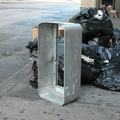 Payphone enclosure left out for trash