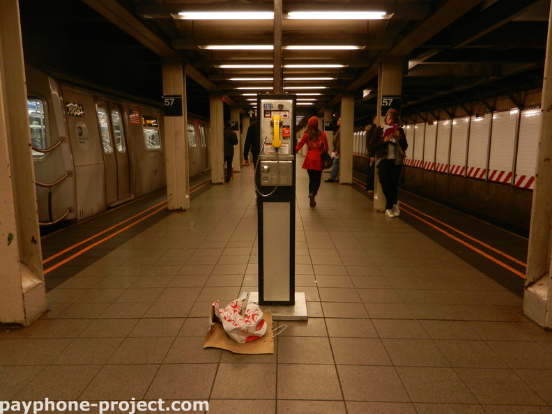 NYC, 57th St. N/Q/R Subway Station. (212) 245-9728. December 10, 2011