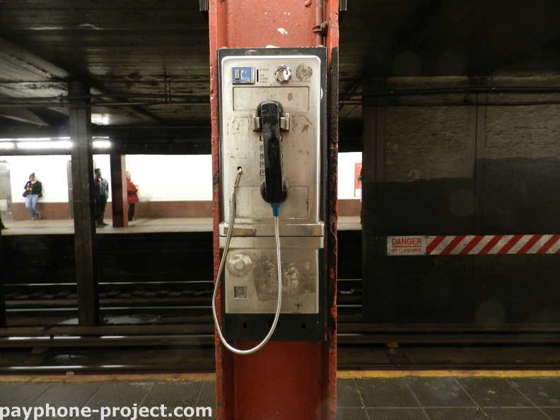 (718) 392-9667. Abandoned subway payphone, Court Square/23rd Street