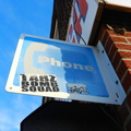 Payphone sign but no payphone below. Outside Alpha Omega Botanica. Woodside, Queens.