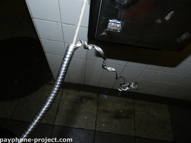 Abandoned subway payphone. December, 2013.