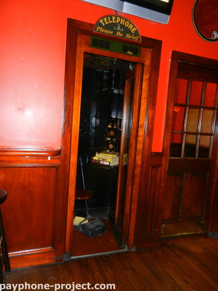 "Please Be Brief." Old Wood Phone Booth. Astoria, Queens. Summer, 2012.