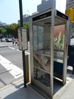 The artwork on this Manhattan phone booth advertises The High Line park.