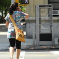 Payphones are fading fast, thanks mostly to the rise of the cell phone. (3007 visits) It seemed symbolic to me that a woman talking her cell phone passed by right as I snapped this pictu... Payphones are fading fast, thanks mostly to the rise of the cell phone.
