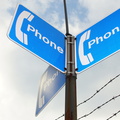 Trio of payphone signs lurking over this NYTCC payphone...remarkably clean and shiny