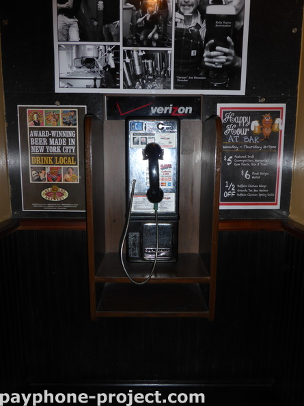 (212) 242-9333. Abandoned Verizon Payphone. Heartland Brewery.