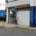 Abandoned payphone outside a Duane Reade. Middle Village, Queens.