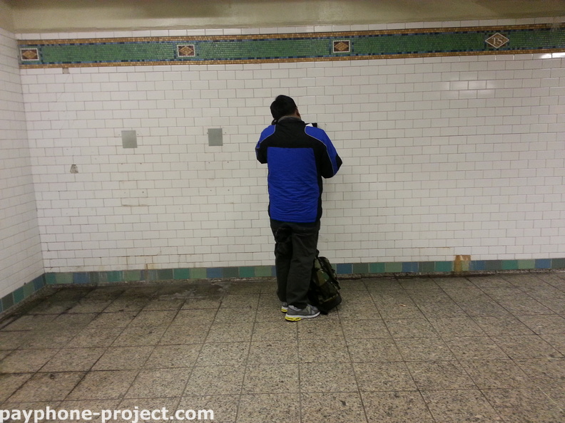On The Phone. Times Square Subway Station.