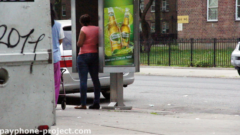 People Using New York City Payphones.