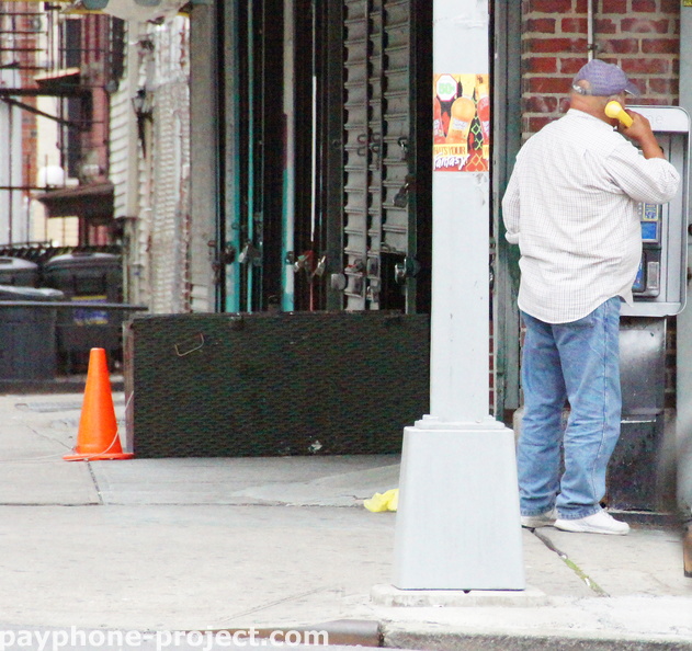 People Using New York City Payphones.
