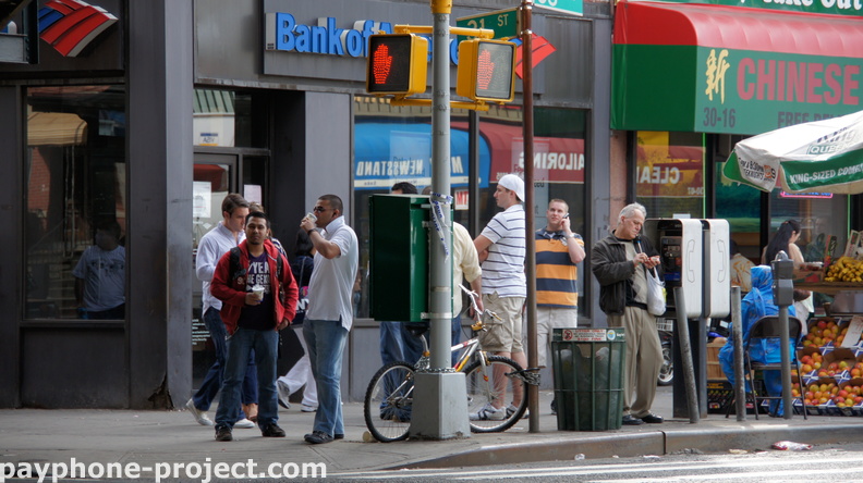 People Using New York City Payphones.