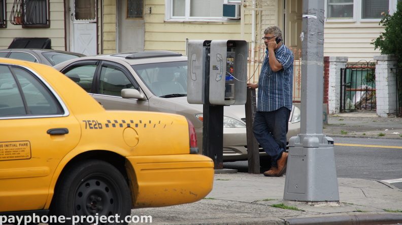 People Using New York City Payphones.