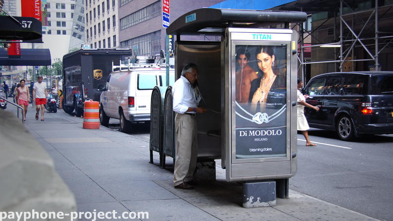 Talking on the Titan. West 58th Street near 6th Avenue