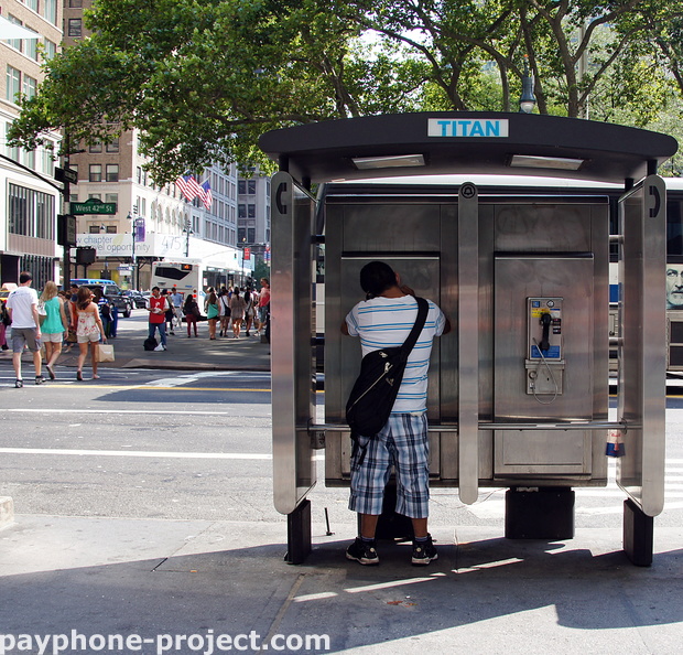 Talking on the Titan. 42nd Street and Fifth Avenue