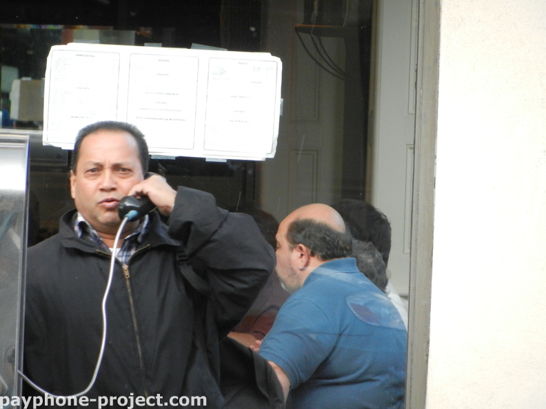 People Using New York City Payphones.