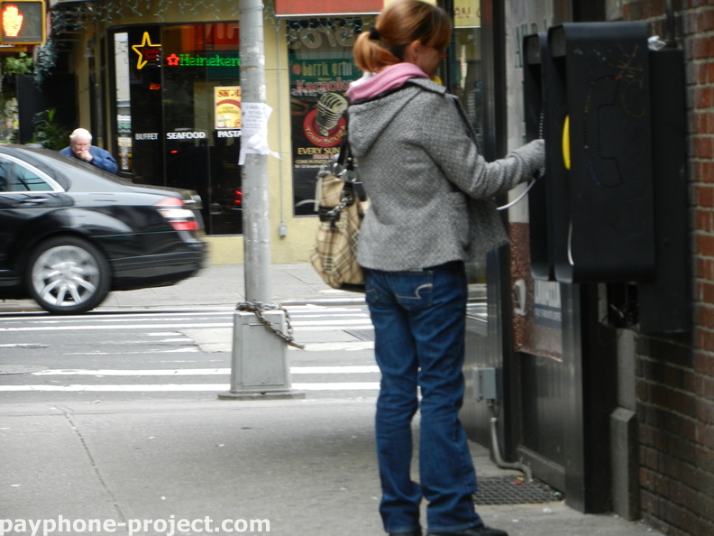 People Using New York City Payphones.