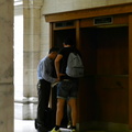 Huddled Around the Phone Booth. (212) 221-9522