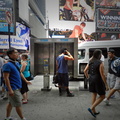Man in Times Square using one of New York City's most famous payphones.