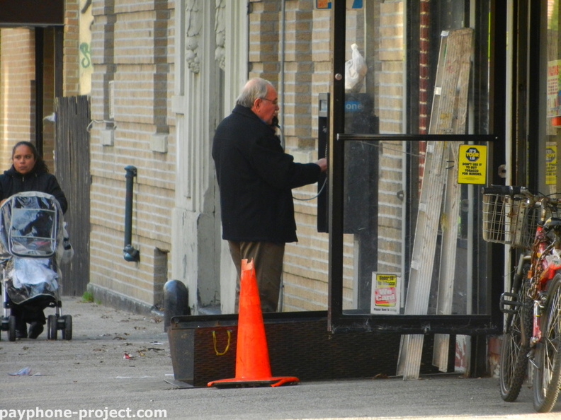 People Using New York City Payphones.