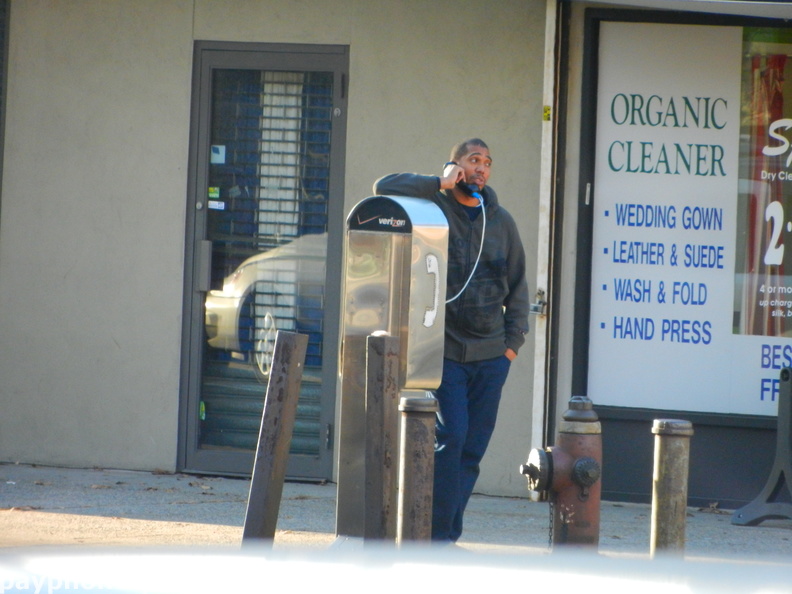 People Using New York City Payphones.