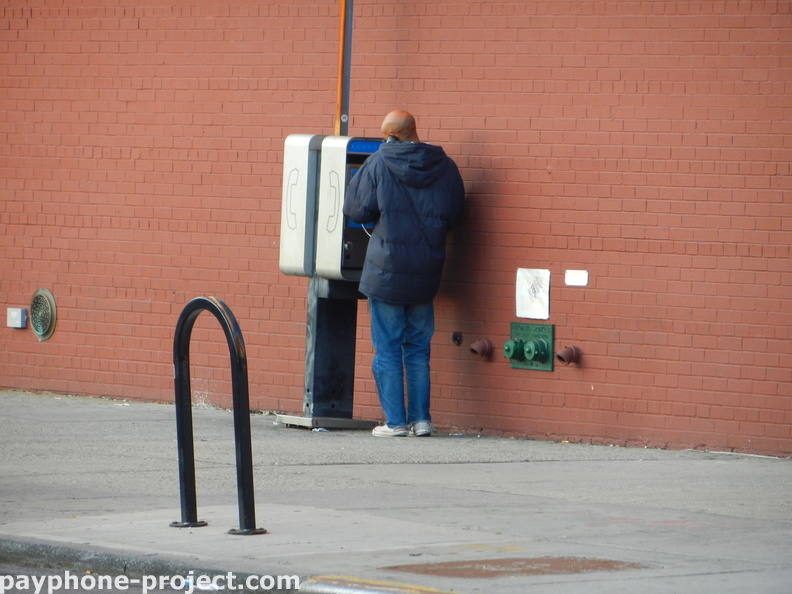 People Using New York City Payphones.