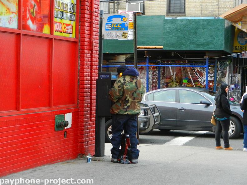 People Using New York City Payphones.