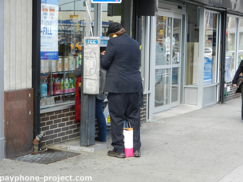 People Using New York City Payphones.