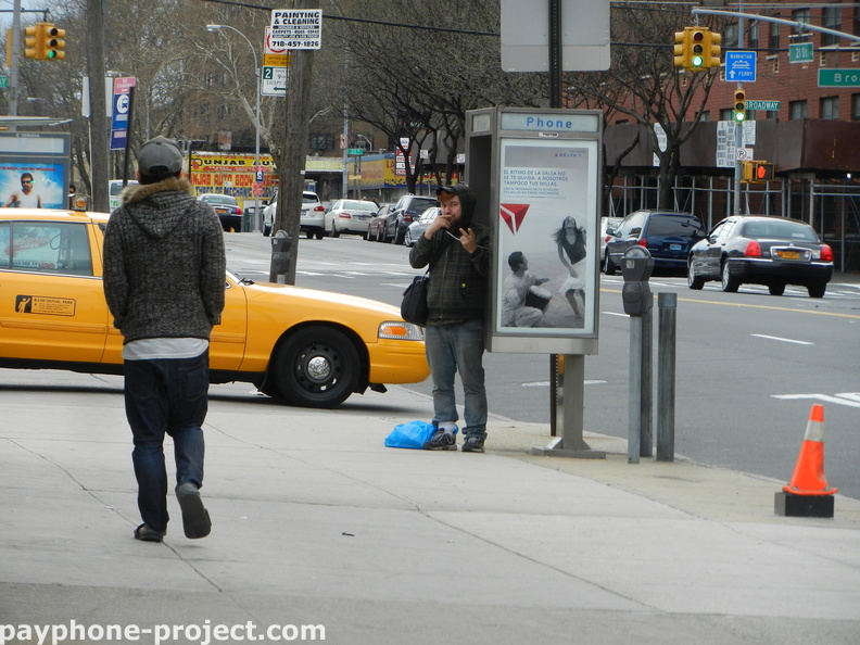 People Using New York City Payphones.
