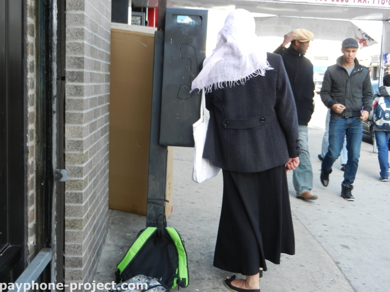 People Using New York City Payphones.