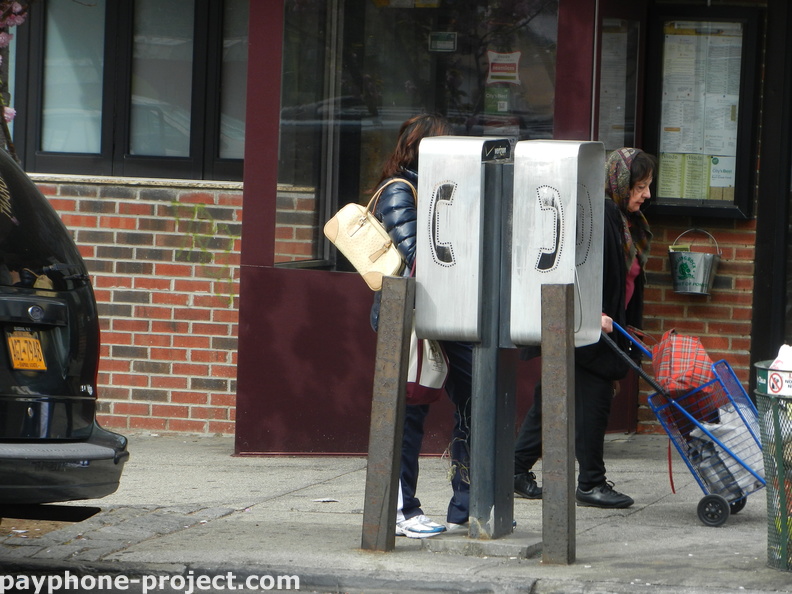 People Using New York City Payphones.