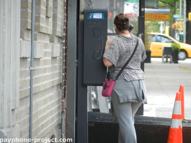 People Using New York City Payphones.
