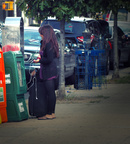 Stranded tourists still use payphones