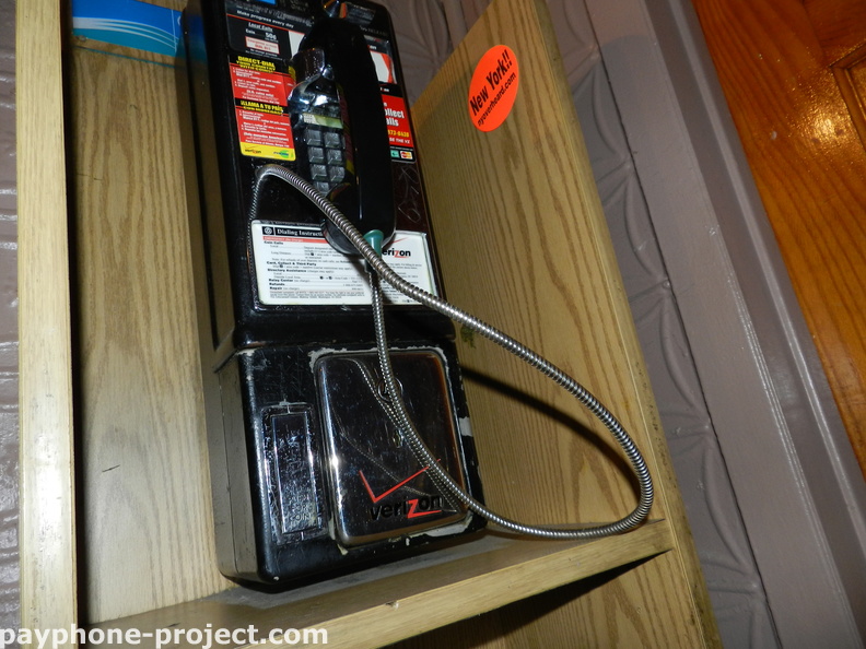 This payphone's number was either 212-473-9892 or 212-473-9787.
