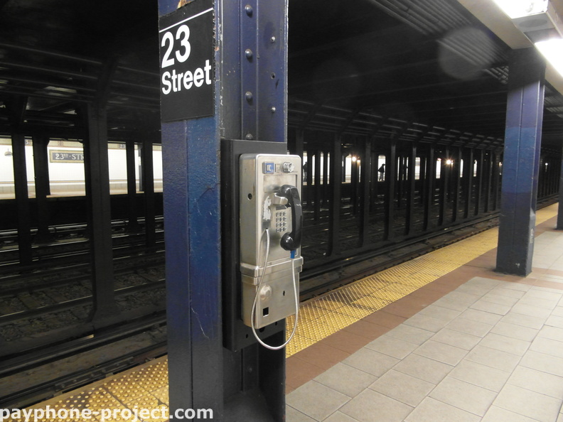 23rd Street N/R Subway Station. Abandoned PTS payphone.