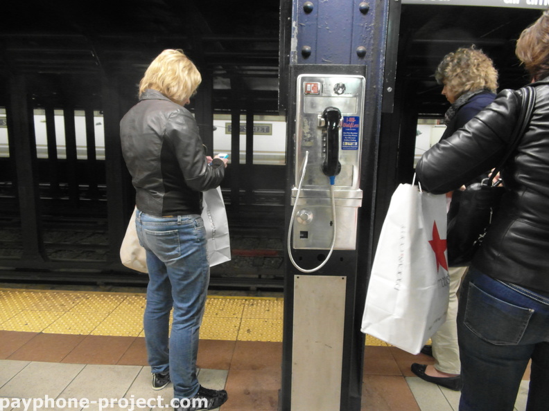 (212) 420-8693. 23rd Street N/R Subway Station. Abandoned PTS payphone.