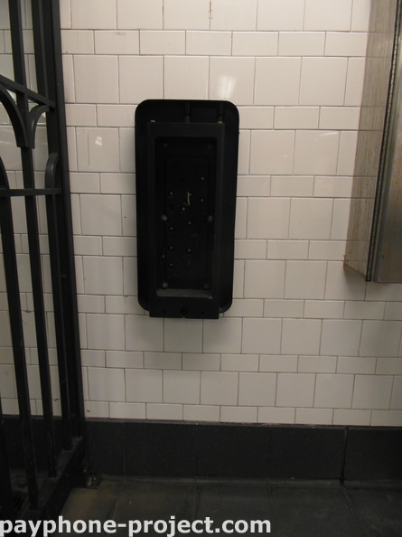 Abandoned Payphone Carcass. 77th Street Subway Station.