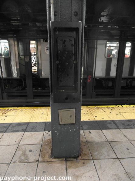 Abandoned Payphone Carcass. 86th Street Subway Station.