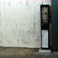 Greenpoint Avenue G Train Subway Station. Abandoned Payphone Carcass.