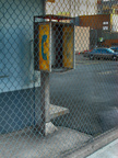 Jackson Ave. and Orchard Street. Abandoned Payphonew Carcass.