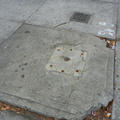 All that remains of these payphones are these bloody stumps on the sidewalk