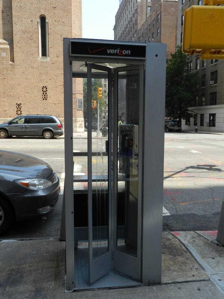 Located at 825 West End Avenue, at the corner of 100th Street, this Verizon phone booth seems to be in the best condition among the other remaining Manhattan phone booths. The door opens and closes, and the overhead light inside works.