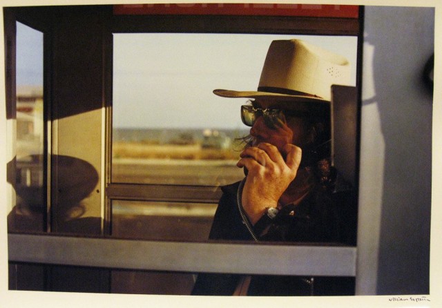 William Eggleston: Walter Hopps In A Phone Booth. 1974