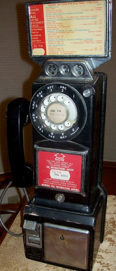On eBay: 1961 Northern Electric NE-233QA Rotary Pay Phone