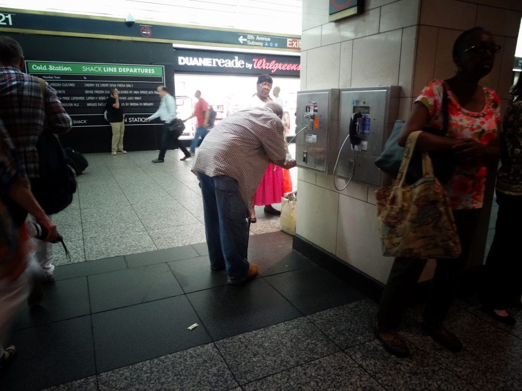 Penn Station Payphone User. August, 2016.