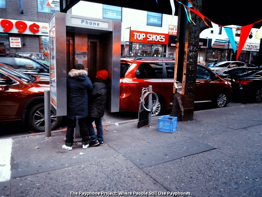 Young Payphone Customers. Woodside, Queens. December, 2016.