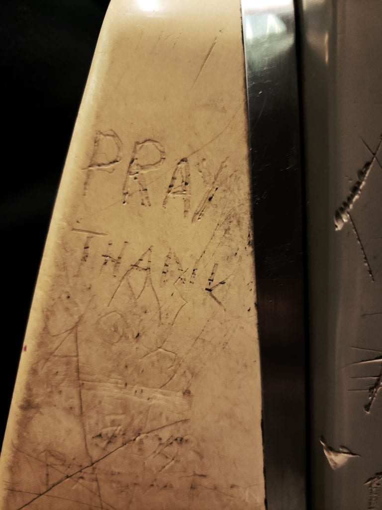 PRAY Scratchiti on the D Train